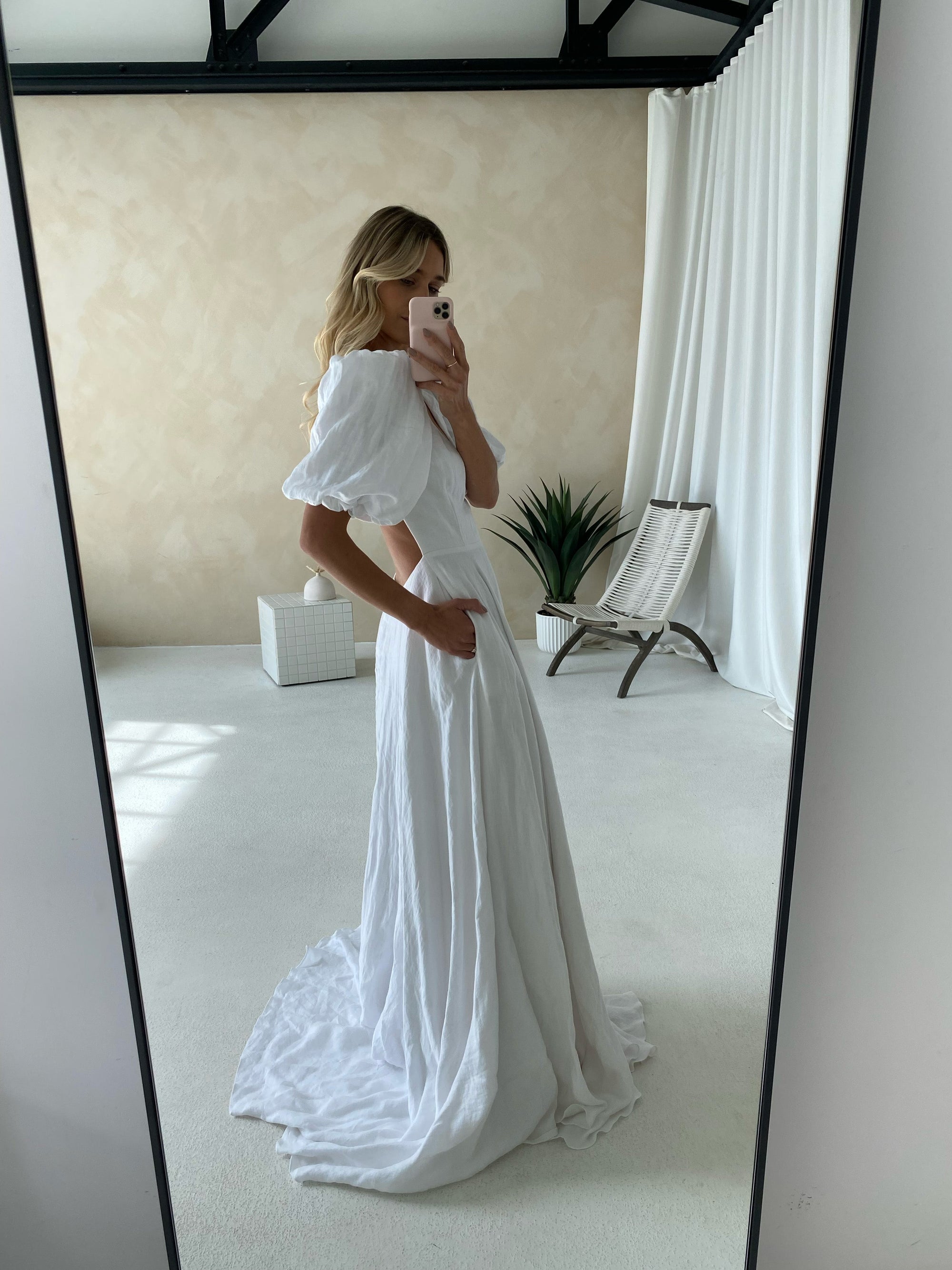 The Perfect Beach Wedding Gown: A Breezy Linen A-Line Dress with Puffy Sleeves and Open Back