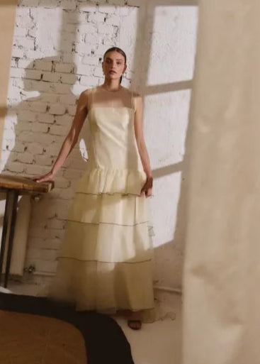 silk organza non traditional wedding dress with ruffles and black detail. Spanish designer