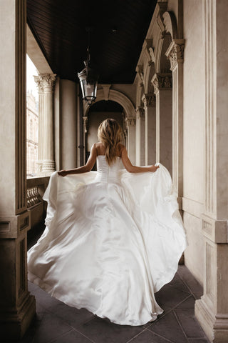 The Flowy Dropped Waist Chloe Gown is the Ultimate Effortlessly Romant Mae Bridal The Flowy Dropped Waist Chloe Gown is the Ultimate Effortlessly Romant Mae Bridal