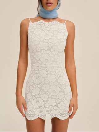 Lakeside Mini Dress by For Love & Lemons, a semi-sheer floral lace mini wedding dress with a high neck and open back, at Mae Bridal