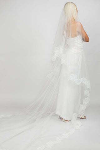 Cathedral wedding veil at Mae Bridal, the Ariel Taub Queenly Two-Tier Cathedral Floral Lace Veil