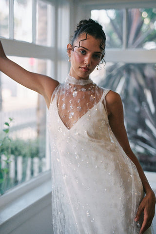 Claire La Faye Cosette Overlay Dress on model, full length over a slip at Mae Bridal, sequin bridal overlay, second look wedding dress, bridal topper