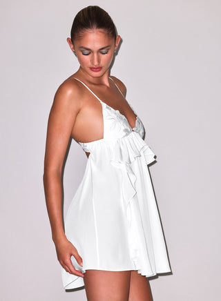 Fleur du Mal Lily Babydoll Dress on model, third angle at Mae Bridal, white bridal lingerie, luxury bridal lingerie, silk lingerie set