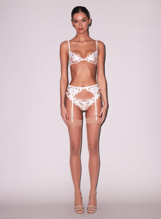 Fleur du Mal Lily Embroidery Garter Belt on model, eighth angle at Mae Bridal, floral embroidery lingerie, wedding underwear, wedding day lingerie