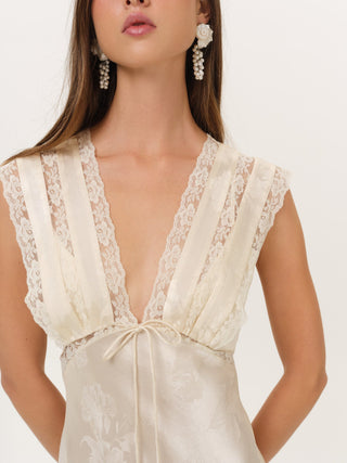 For Love & Lemons Adrift Maxi Dress on model, third angle at Mae Bridal, courthouse wedding dress, vintage wedding dress, lace trim dress