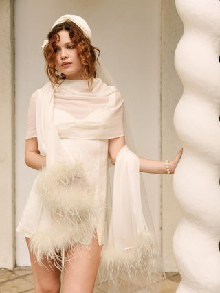 For Love & Lemons Margo Mini Dress and Shawl Set on model at Mae Bridal, second look wedding dress, reception dress, white mini dress
