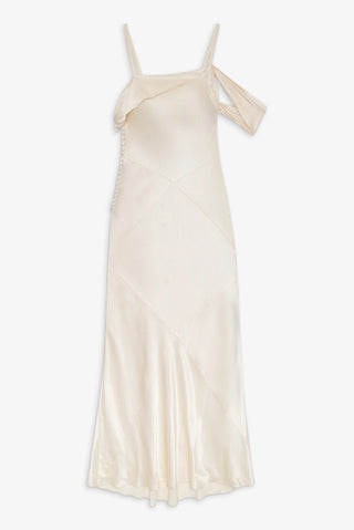 Cream-colored satin slip dress on a white background