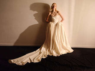 Monetre Elizabeth Diptych Gown side view at Mae Bridal, drop waist wedding gown, satin ball gown, corset wedding dress