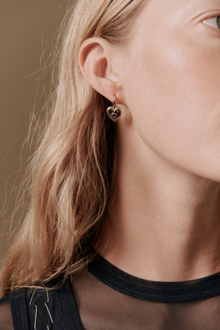 Gold bridal jewelry at Mae Bridal, the Their Studios Billie Heart Gem Earrings, detail