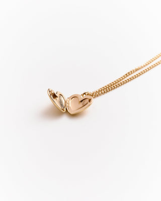 Wedding day jewelry for bride at Mae Bridal, the Their Studios Bowie Heart Locket, detail