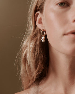 Their Studios Danny Drop Pearl Earrings, on model, unique bridal jewelry at Mae Bridal
