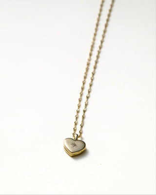 Their Studios Lily Heart Locket front view at Mae Bridal, dainty heart locket, dainty bridal jewelry, wedding jewelry necklace