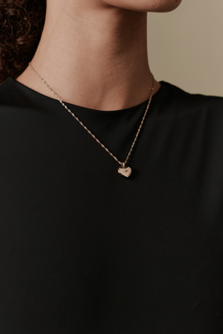 Wedding day jewelry for bride at Mae Bridal, the Their Studios Lily Heart Locket, detail