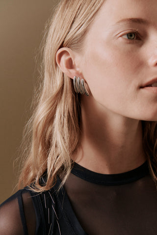 Their Studios Maxime Large Ribbed Earrings on model, second angle at Mae Bridal, ribbed statement earrings, bridal fashion jewellery, modern bridal jewellery designs, recycled gold vermeil and sterling silver