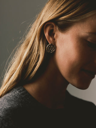 Shelby Swirl Earrings by Their Studios, second angle at Mae Bridal, swirl curl earrings, boho bridal earrings