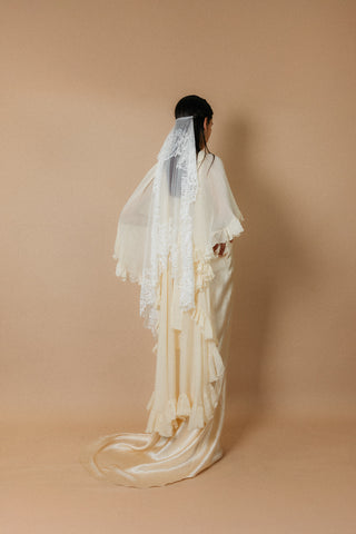 Théoro Frederique Veil styled with a bridal cape at Mae Bridal, silk tulle veil, chantilly lace veil, bridal veil