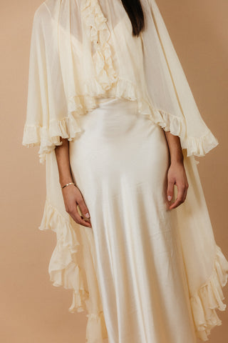 Théoro Matadero Cape ruffle detailing at Mae Bridal, bridal cape, silk chiffon cape, cape wedding gown