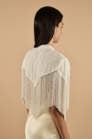 Théoro Rodeo Cape fringe detail at Mae Bridal, beaded bridal cape, fringe bridal cape, bridal cape