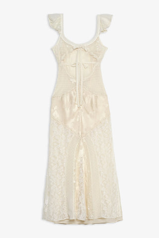 Beige dress with ruffled straps on a white background