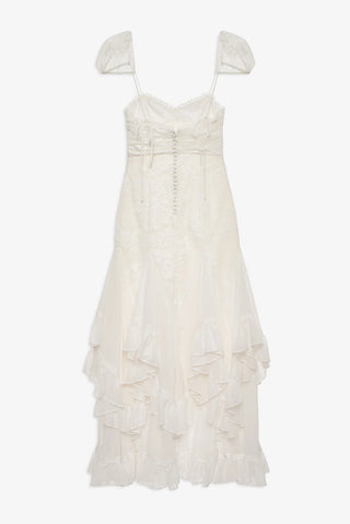 White ruffled dress on a white background